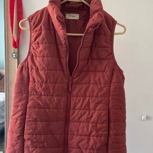 Maroon red vest!